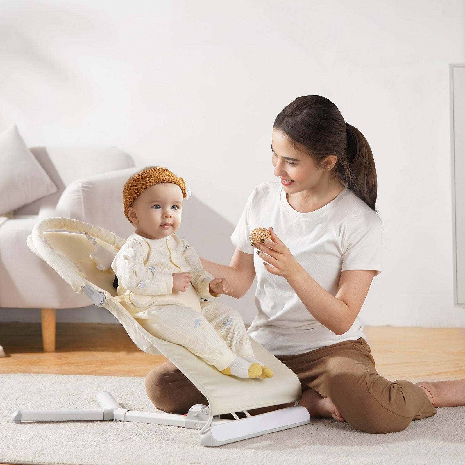 Folding Baby Bouncer Chair for 0-9 Months with 2 Reclining Angles, Rotatable Toy Bar, and Portable Carrying Bag - Indoor/Outdoor Beige Rocker